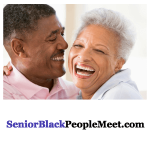 a mature African American couple laughing together